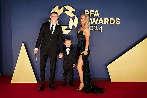 Britain PFA Player Awards: Phil Foden, Rebecca Cooke and son Ronnie Foden arrive Opera House Manchester